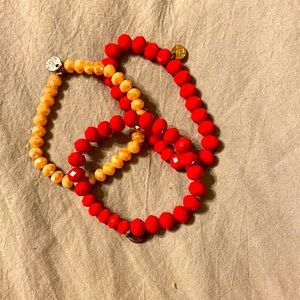 3 Ermish bracelets (2 reds and 1 light gold)
